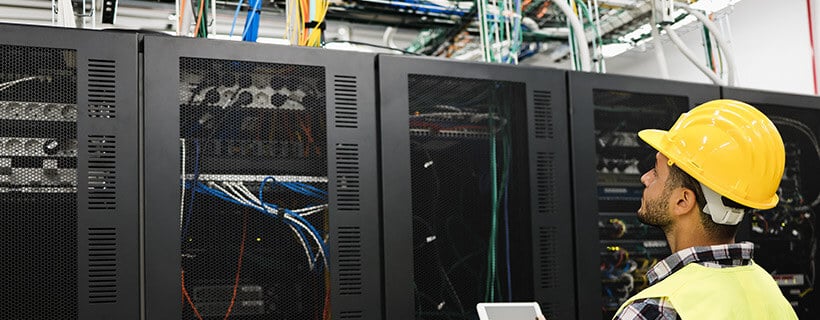 technician-solving-common-data-center-challenges